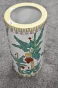 A Chinese porcelain stick or umbrella stand with famille vert decoration