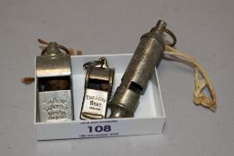 Three vintage whistles including Acme Thunderer, Acme and Acme Scout