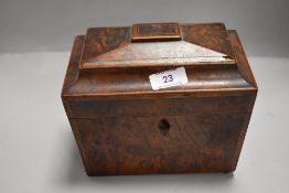 A Victorian tea caddy of casket form with burr yew wood veneered case and double compartment both