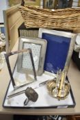 A small assortment of silver plated wares including Apostle style spoons, table salt and three