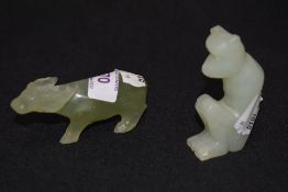 Two pale jade stone carved figures of an Ox and a Monkey