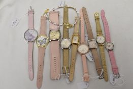 Ten ladies/girls watches with coloured straps.