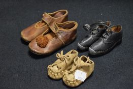 Three pairs of vintage childrens shoes including a Carley leather and button up pair, a set of