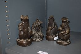 Four modern resin cast figures of mice or rats possibly relating to Beatrix Potter all having