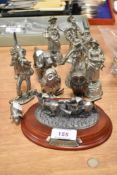 A selection of metal and pewter cast figures including five Cries of London series