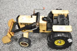 A vintage Tonka childrens toy tractor