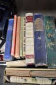 An assorted selection of books including Boys Own Annual, Beatrix Potter and Black Bob
