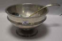 A Thomas Willaims pewter punch bowl with a large ladle