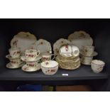 An early 20th century Wellington china part tea service having gilt and floral pattern