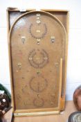 An early 20th century bagatelle game board