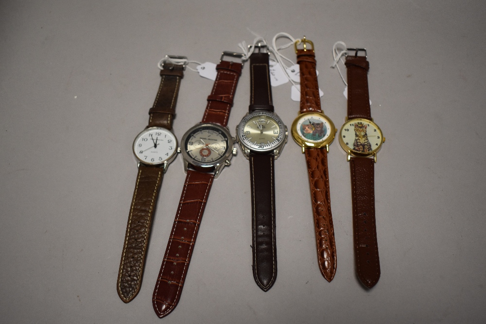 Five mens watches all having brown straps, including Mercier.