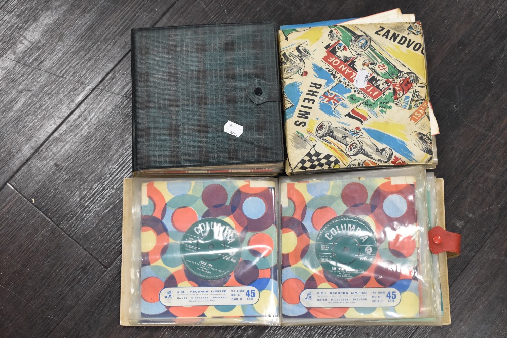 Three vintage 45rpm record cases full of pop and rock singles including a large collection of the