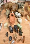 A herd of African and Indian Elephant figures including stone carved, tribal hard woods and ceramic