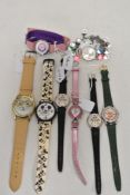 Eight ladies/girls fashion watches including Mickey mouse and teddy bear.