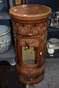 A Victorian Doulton Lambeth jardiniere stand with ceramic body under brown glaze with pierced