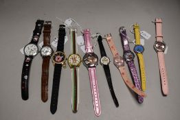 Ten ladies/girls watches including Disney and Hello Kitty.