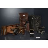 An early 20th century Compur Ensign Carbine Tropical model camera, Patheorama, VP Twin and