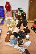A good selection of mid century Avon vanity bottles including dogs, cats and E.T