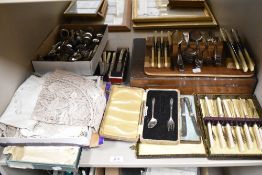 A good selection of cutlery and table wares including hm silver handled cased fruit knives, fish