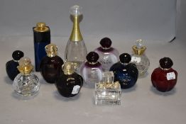 A selection of modern ladies empty perfume bottles including Dior Poison