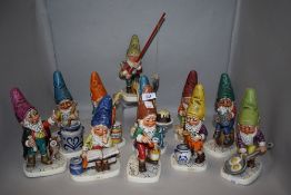 Eleven mid century Goebel gnome figure studies including Sam, Fritz, Bob and Petri. Orange hat gnome