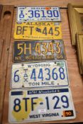 Five vintage American license plates