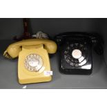 Two 20th century GPO telephone sets in black and beige