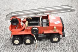 A vintage Mogul fire fighter toy truck