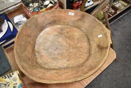 A large African wooden grain fruit or food bowl