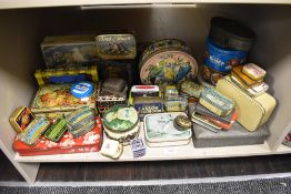A collection of early 20th century transfer printed advertising tins including Bond and Union,