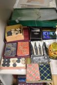 A selection of early 20th century games including Royal Stewart cards, draughts, darts and