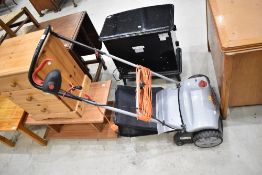 An electric lawn rotavator/aerator