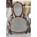 A 19th Century mahogany framed armchair in the Aesthetic style with later dralon upolstery