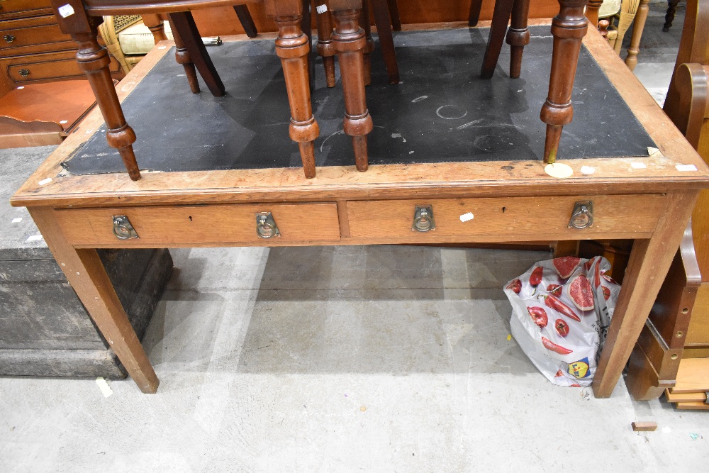 A late 19th or early 20th Century oak desk of large proportions