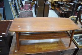 A vintage teak coffee tables having slatted undertier