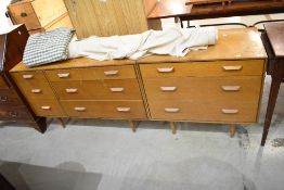 Two vintage golden oak low chests of drawers, Gomme or similar, width approx 112cm and 76cm