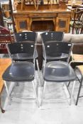 A set of four chrome and plastic kitchen bar stools