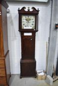 A 19th Century oak long case clock having 8 day movement , and painted dial named for John Latham,