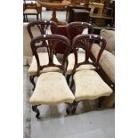 A set of four Victorian mahogany dining chairs