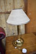 A modern brass table lamp