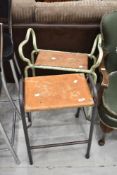 Two utility style stools (one may be a garden kneeler?)