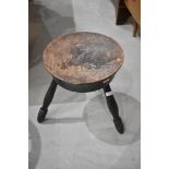 A traditional pokerwork stool carved 'TOUCH ME WHA DAUR' The circular top with thistle flower and