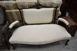 A 19th Century salon settee, later upholstery