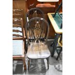 A pair of wheelback kitchen chairs