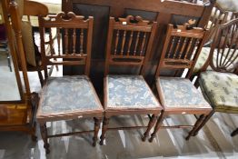 Three Victorian mahogany spindle back salon chairs