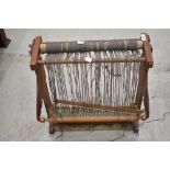 A traditional weaving loom of small proportions