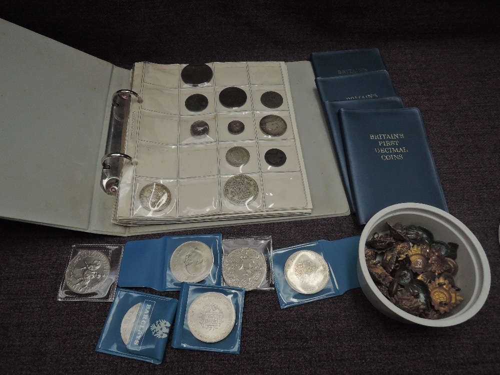 An album of mainly GB Coins including 1707 Cartwheel Penny, Roman Silver and Later Silver seen along