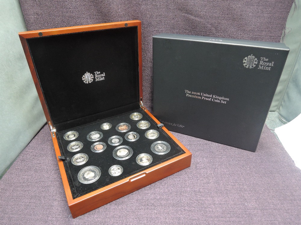 A Royal Mint United Kingdom 2016 Premium Proof Coin Set, 17 coins with certificate in wooden