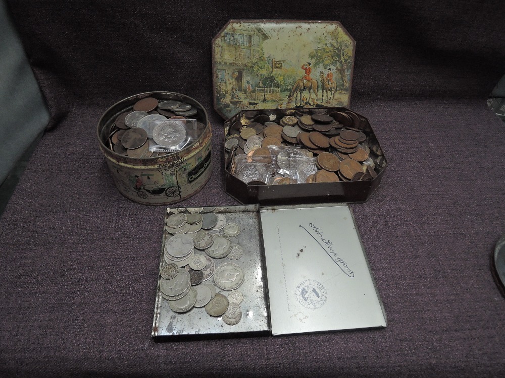 A collection of GB Coins in three tins including Copper & Silver