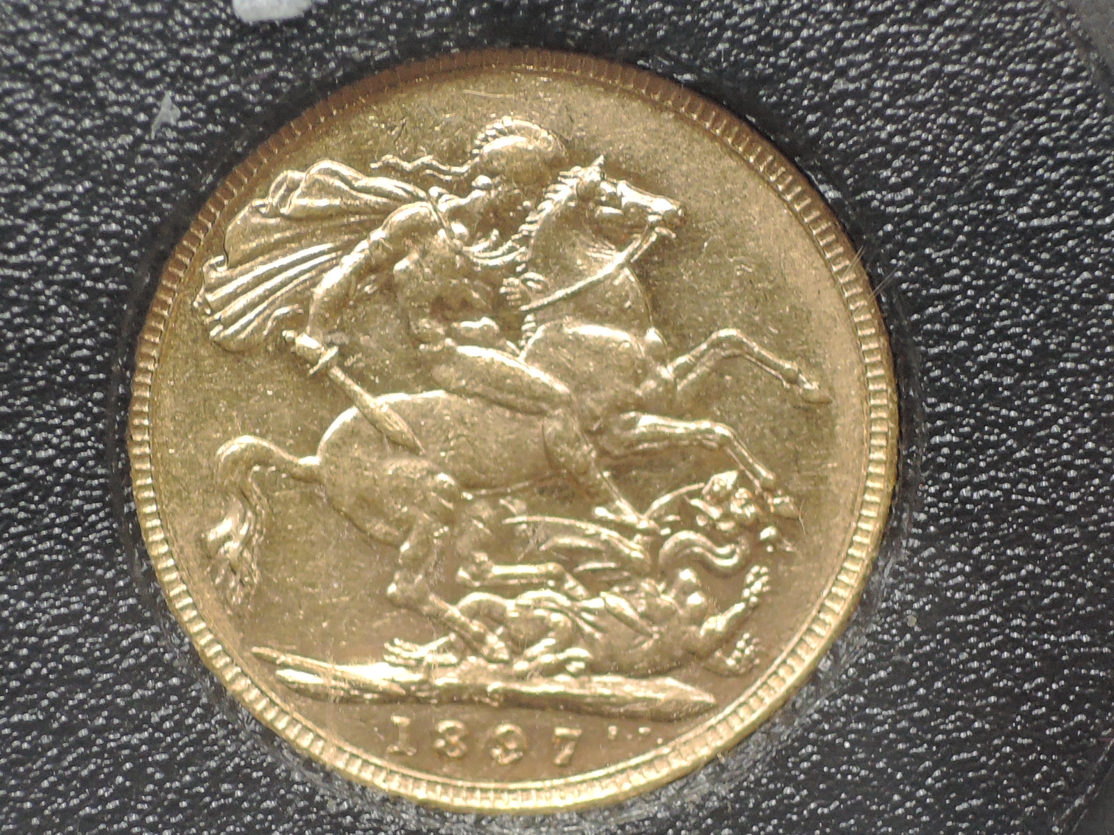 A United Kingdom 1897 Queen Victoria Gold Sovereign, Old Head, George & Dragon, Sydney Mint with - Image 2 of 3